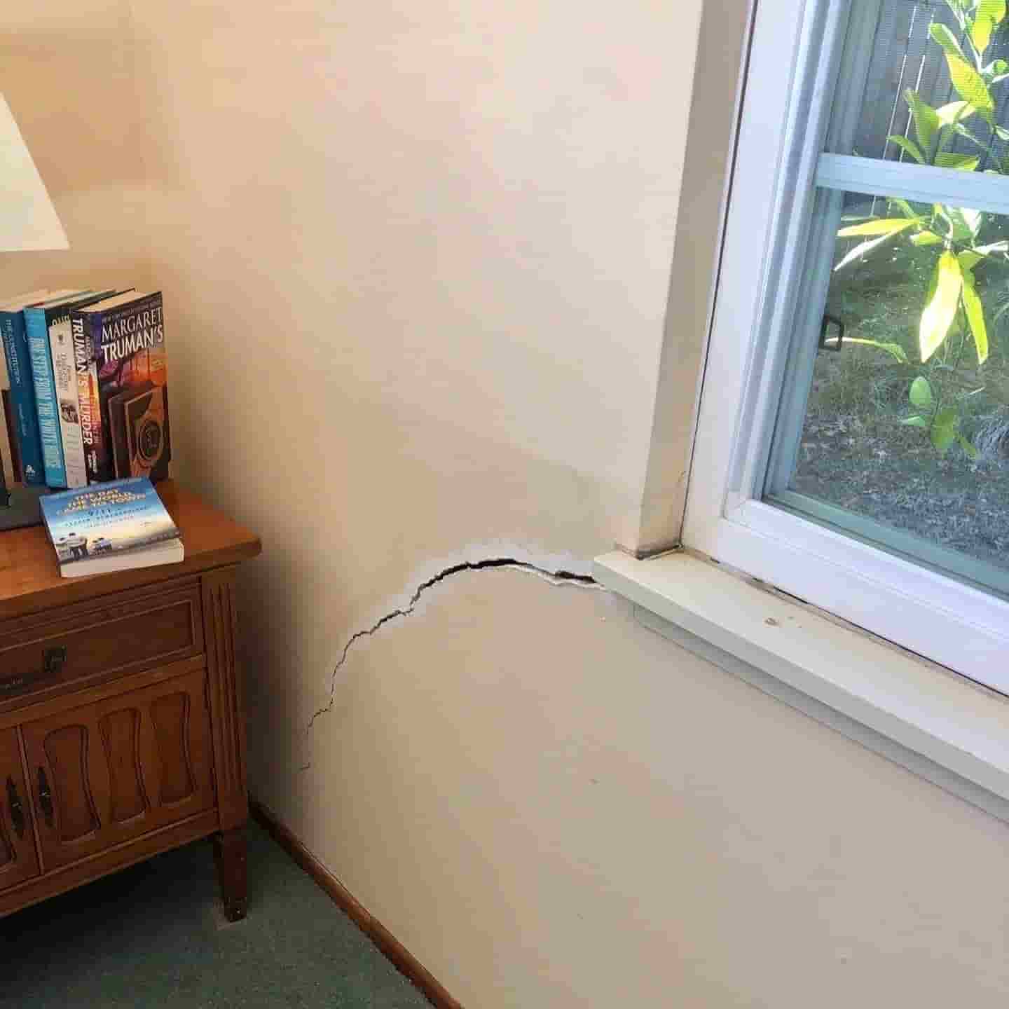 Early warning signs of drywall cracks diagnosed at the foundation, not the patch on a Midwest home