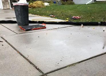Cracked Driveway at an Epp Foundation Repair project