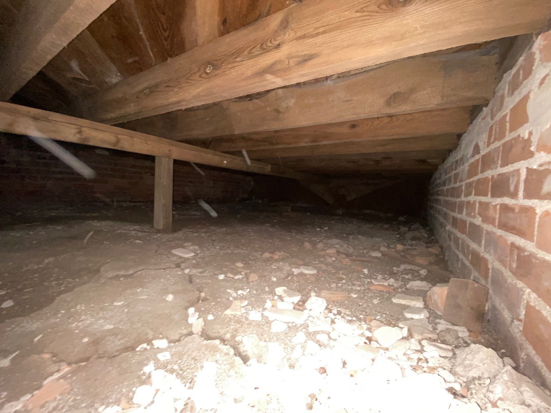 Underlying cause of broken or cracked floor joists: stabilize before they fail in Midwest homes