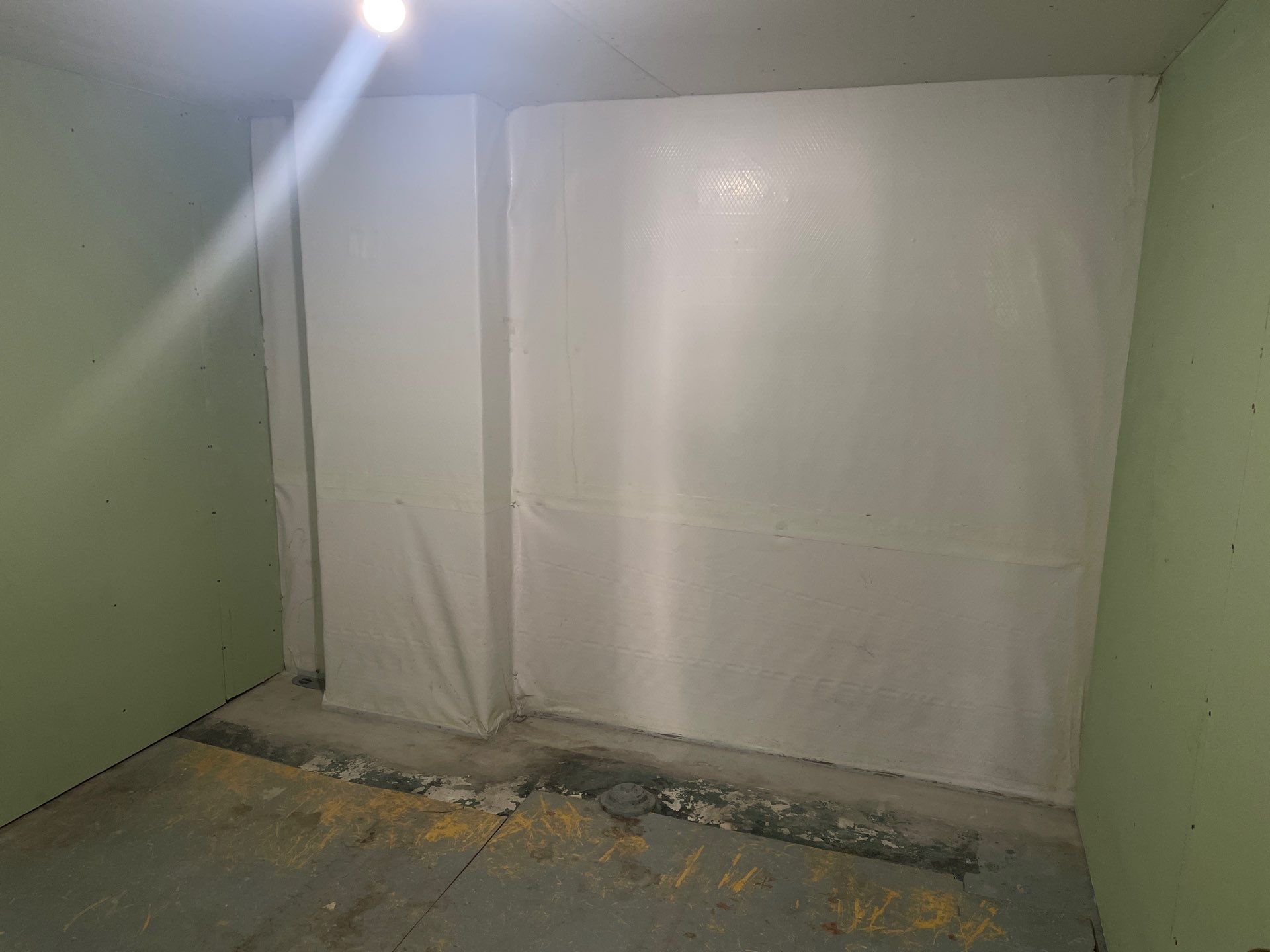Epp Foundation Repair installing a crawl space vapor barrier and drainage system for moisture control in Lincoln, NE.