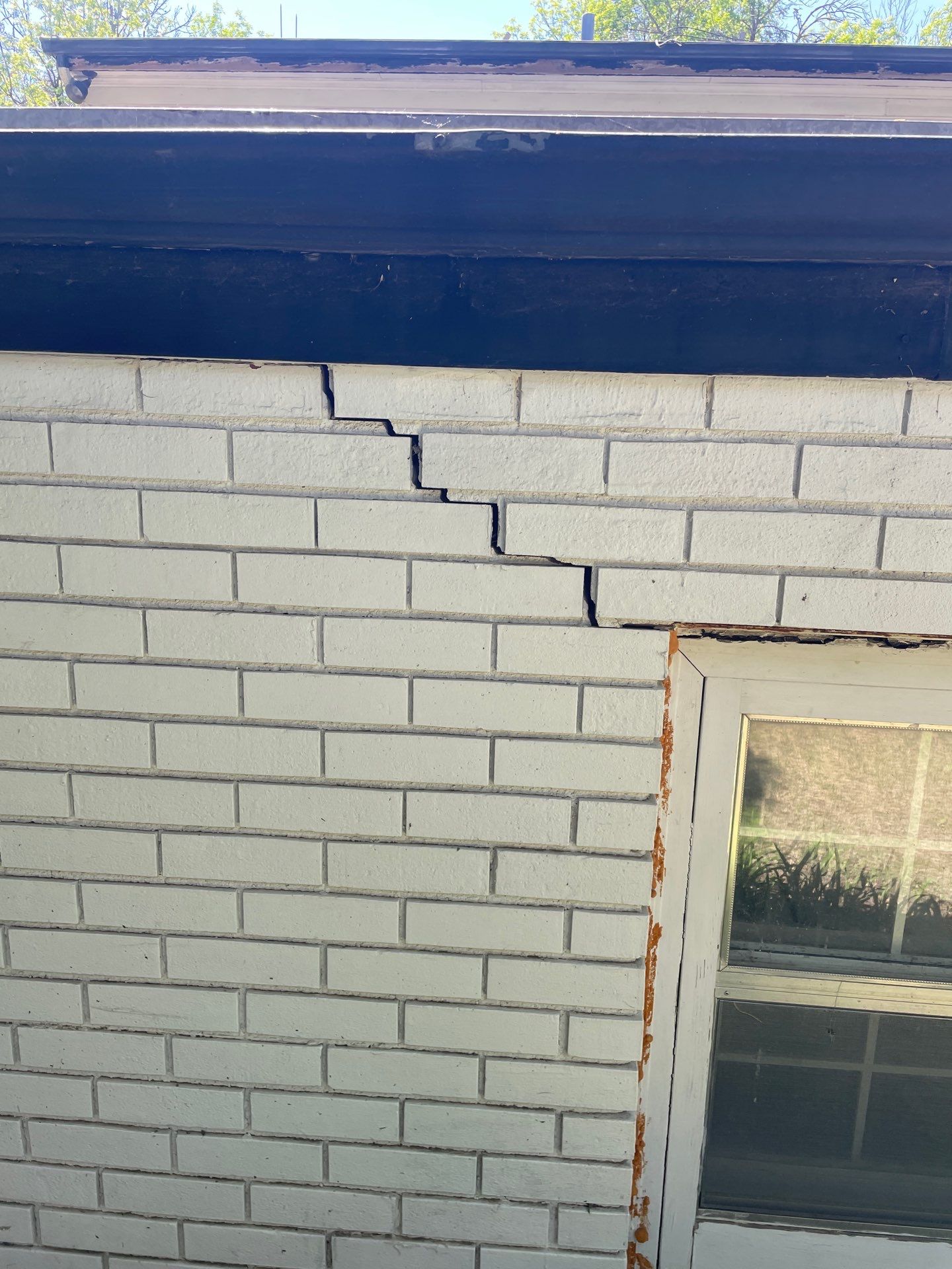 Stair-step cracks in block or brick walls.